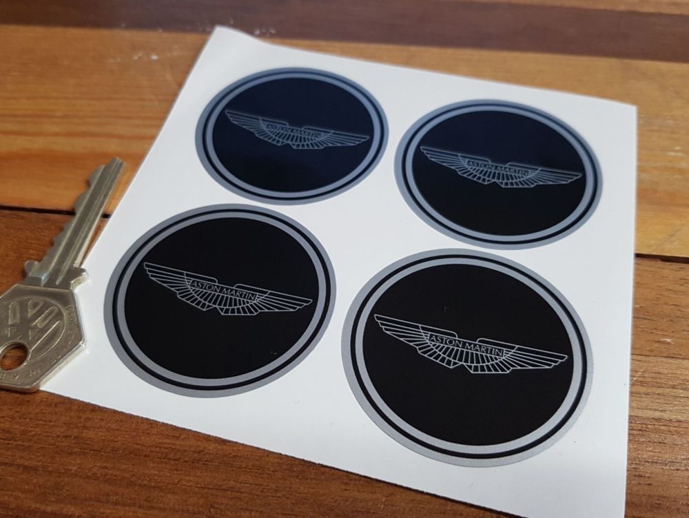 Aston Martin. Wing Logo Black Wheel Centre Stickers. Set of 4. 50mm.