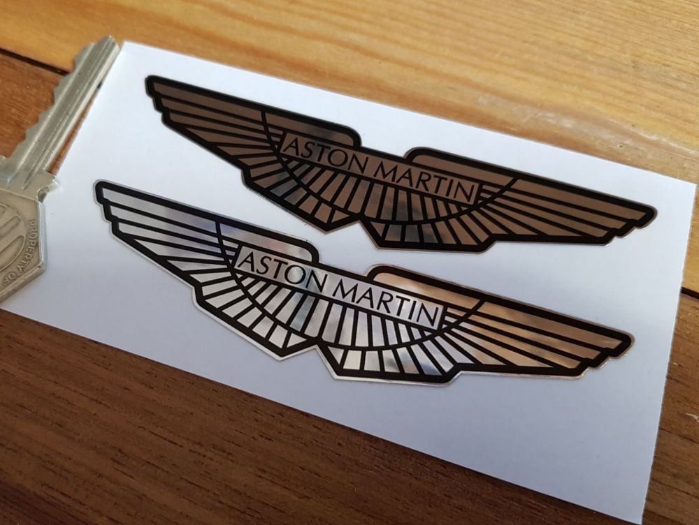Aston Martin Winged Chrome Style Stickers. 4" Pair.
