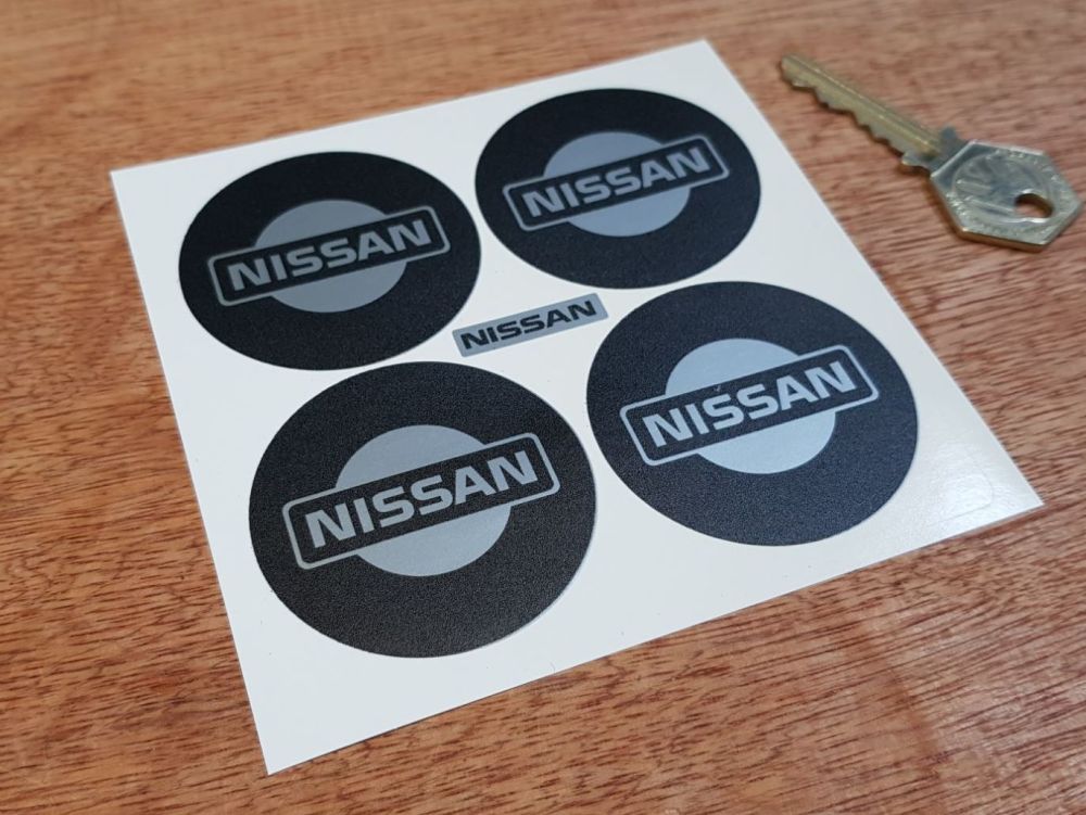 Nissan Logo Wheel Centre Stickers. Black & Silver. Set of 4. 50mm.