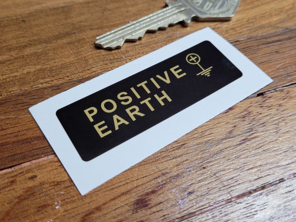 Positive Earth + Black & Gold Sticker - 60mm