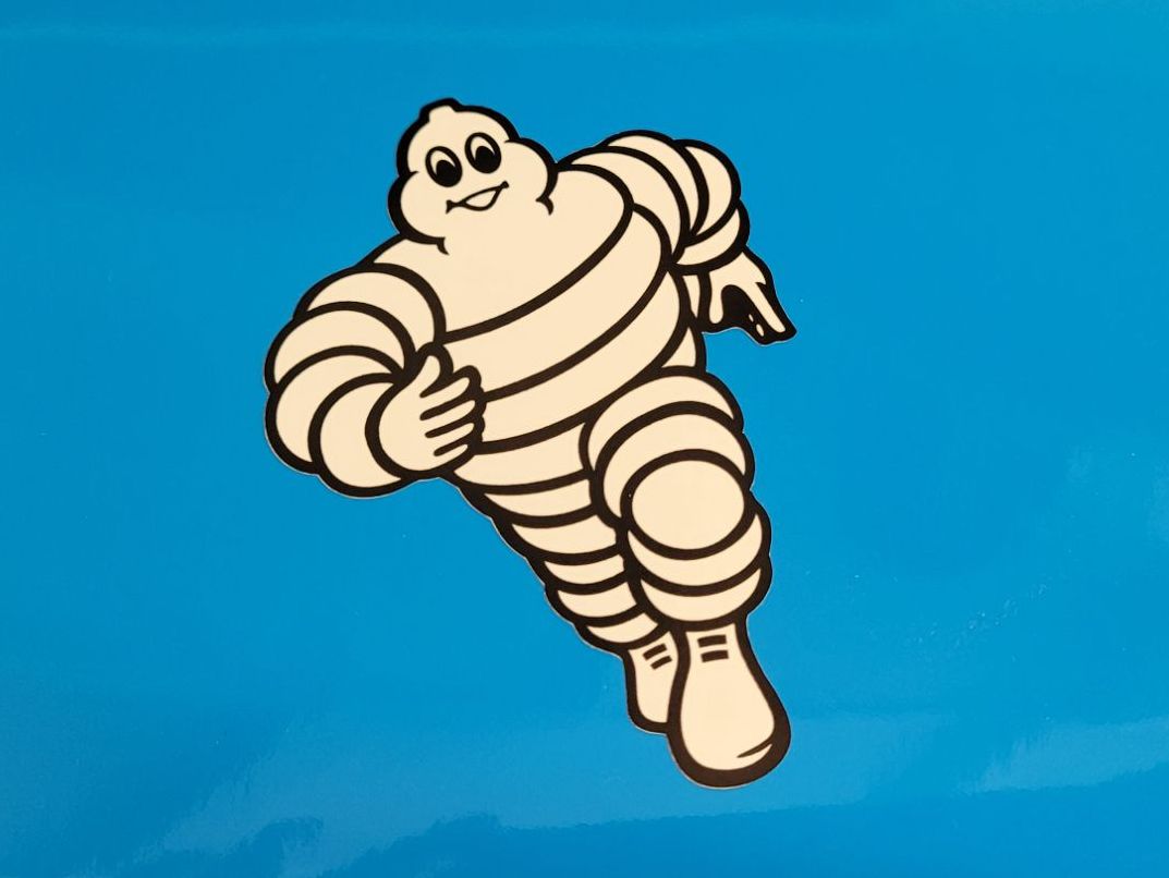 Michelin Bibendum Running Towards Sticker - 5", 6", 8.5", or 12"