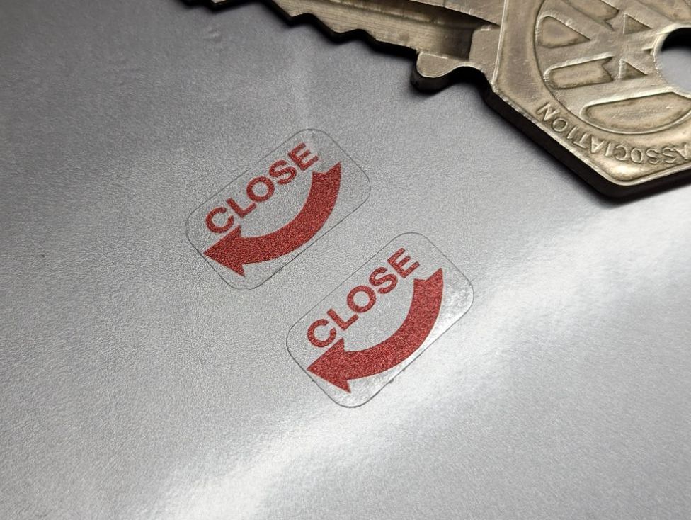 Close Arrow Red & Clear Stickers - 15mm Pair