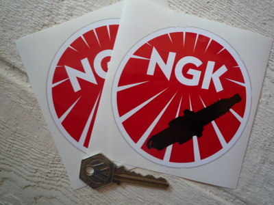 NGK Round Black Spark Plug Stickers. 4" Pair.