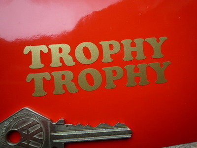Triumph Trophy Cut Vinyl Gold Text Stickers. 3" Pair.