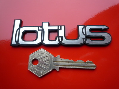 Lotus Interlocking Text Laser Cut Self Adhesive Car Badge. 4".