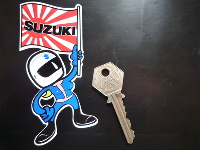 Suzuki Flag Waving Babe Sticker. 4".