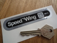 Vindec Speed Wing 25 Black, White, & Foil Sticker. 4".