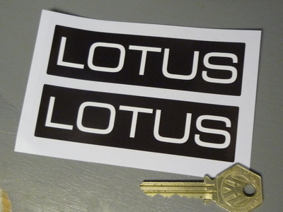 Lotus White Text on Black Oblong Stickers. 4.25" Pair.