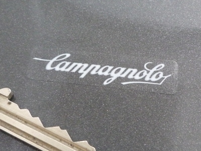 Campagnolo Script Wheel Stickers Set of 5. White on Clear. 2".
