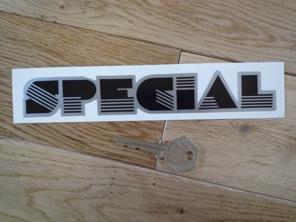 Special Black & Silver Shaped Sticker. 7.25".
