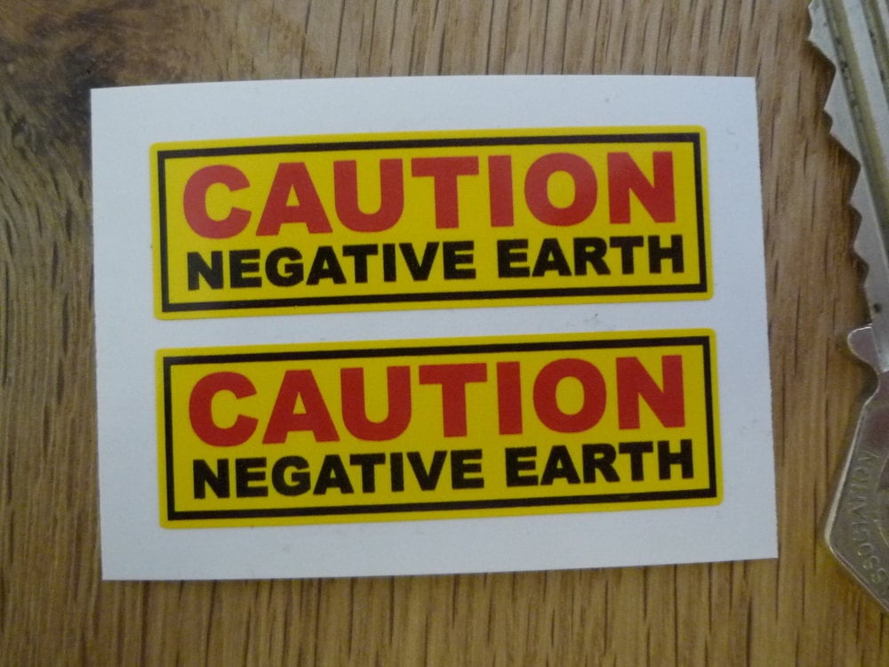 Caution Negative Earth Yellow Stickers. 2" Pair.