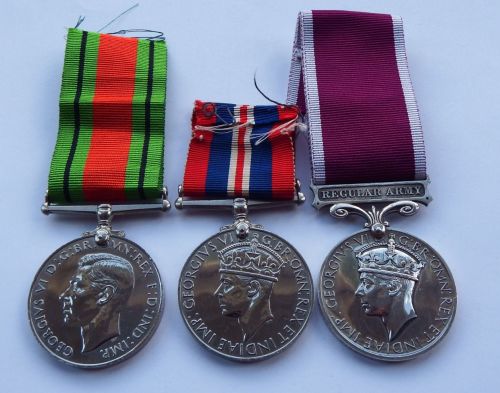 Long Service group to Captain P E Joynes Sherwood Foresters / late Colour S