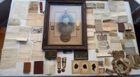 The Medals and time capsule of documents to the Wilkinson family