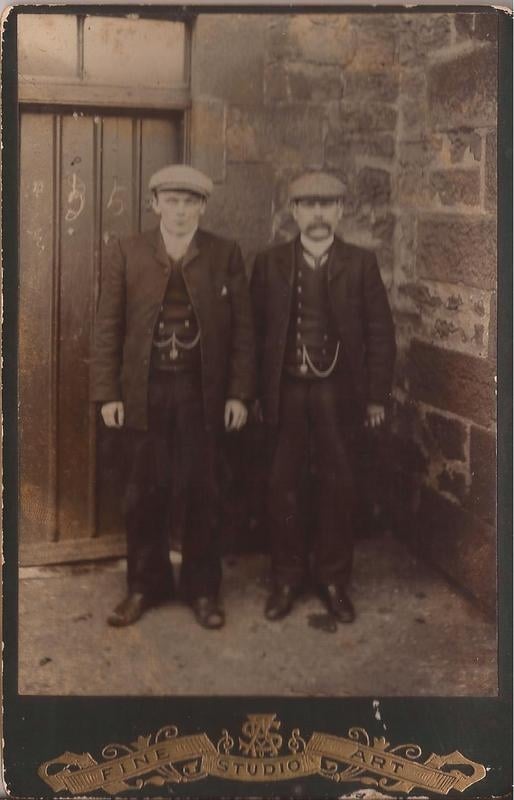 DLI men stood at door