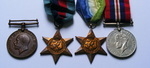 Father and Son group Mercantile Marine Medal to Joseph P Tuck and WW2 Navy Group to A Tuck