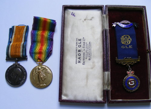 Pair and Solid Silver Masonic medal to T Z 8274 J A Forster AB RNVR later D