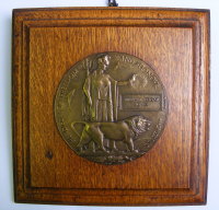 Memorial Plaque to William Edgar Jones mounted in solid oak