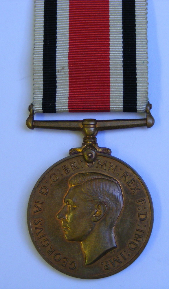 Special Constabulary Medal to COMDT James D Charmichael