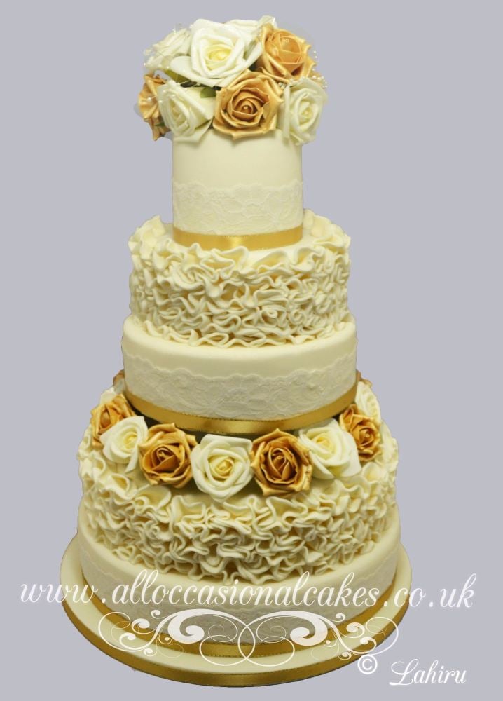 gold and ivory ruffle wedding cake