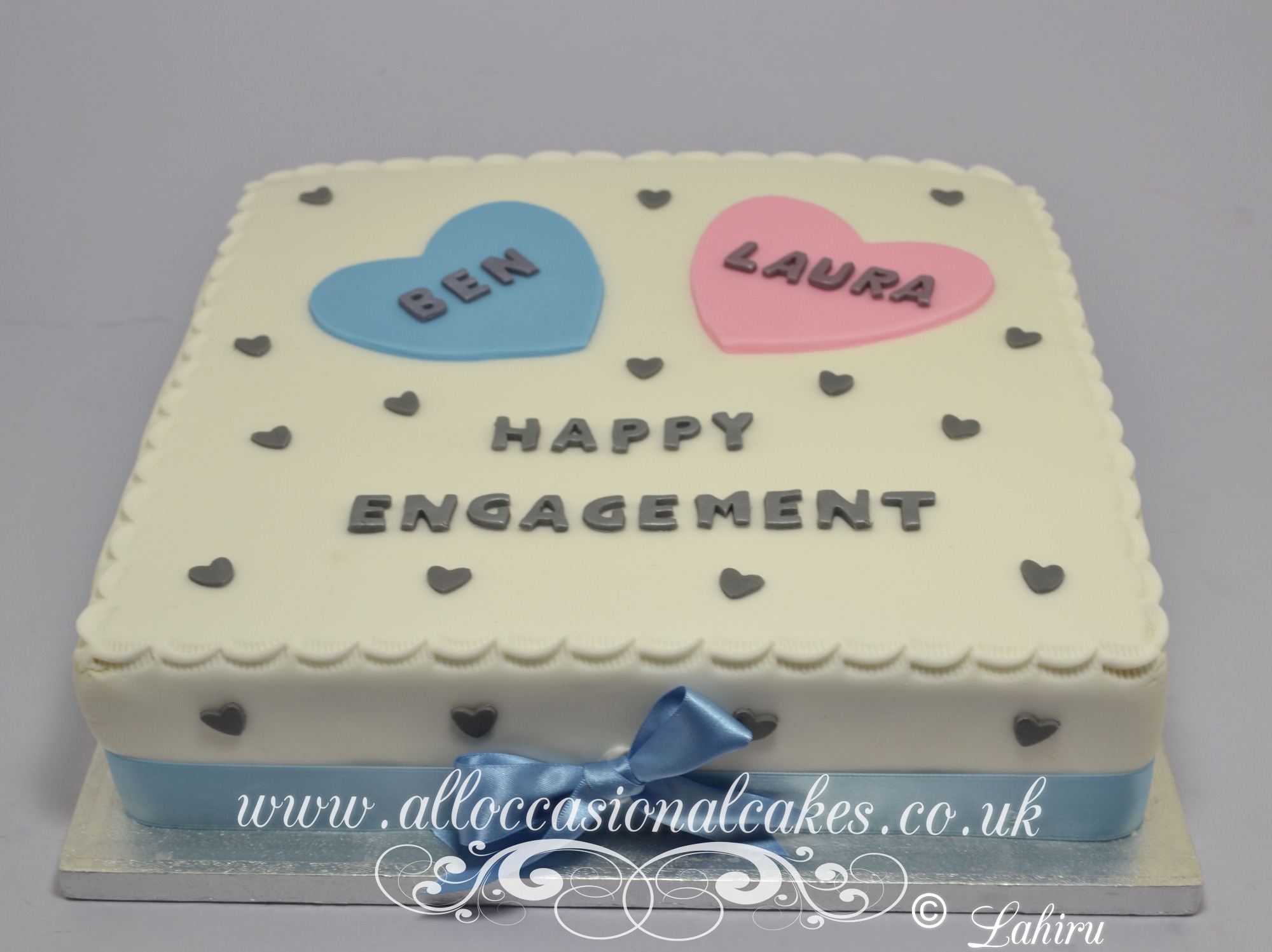lue and pink heart engagement cake