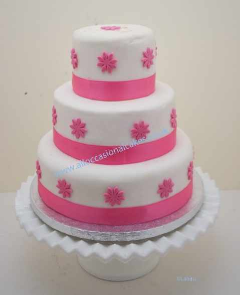 pink daisy wedding cake