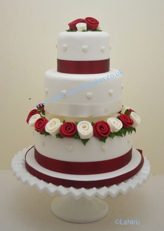 ruby and ivory rose wedding cake 