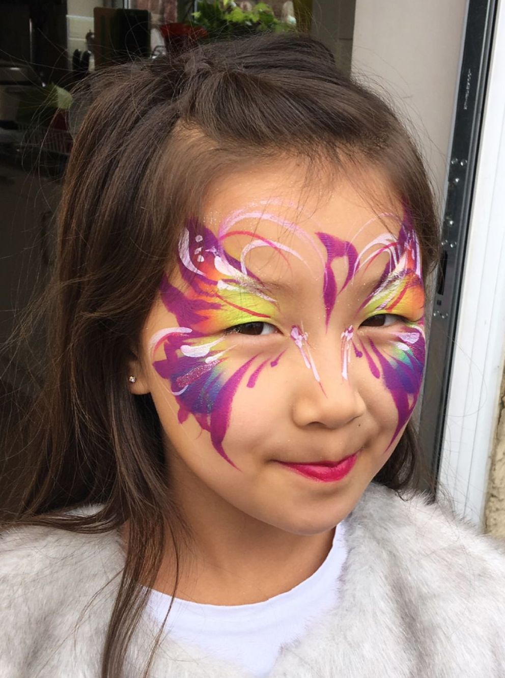 face painting rainbow butterfly