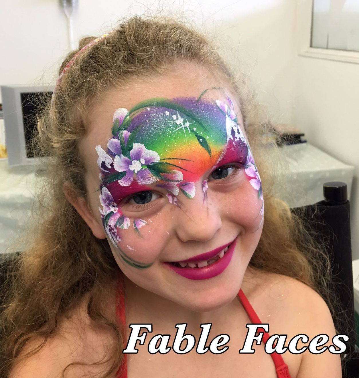 face painting rainbow flowers girl design