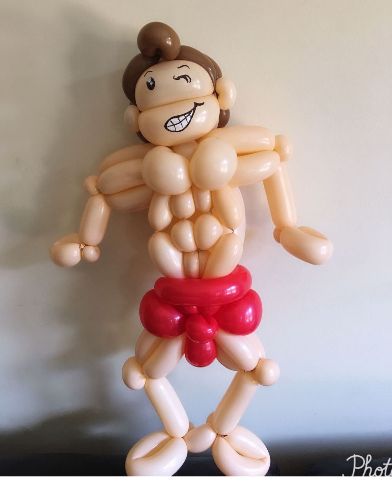 balloon twisting body builder hunk