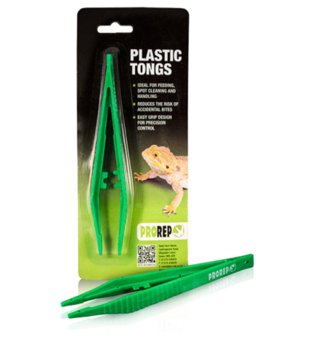 Small green plastic feeding tongs