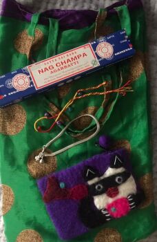 Recycled silk bag with Incense, a felt purse, bell bracelet and Indian ankle bracelet