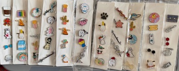Job lot if 55 pin badges on cards