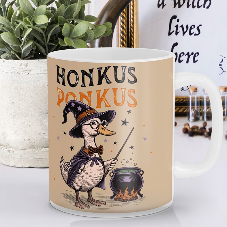 Personalised Honkus Ponkus Halloween Goose Mug | beige mug with black and orange vintage-style illustrations with black cat on pumpkin and wizard goose