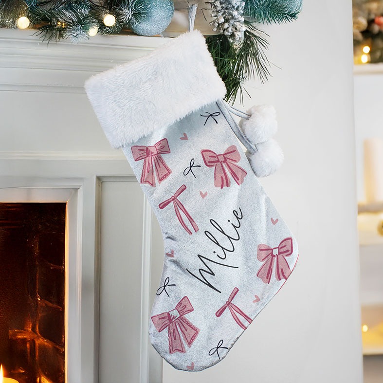 Personalised Pink Bow Christmas Stocking | plush velvety pale grey coquette Santa stocking with fluffy white pompoms, personalised with your name