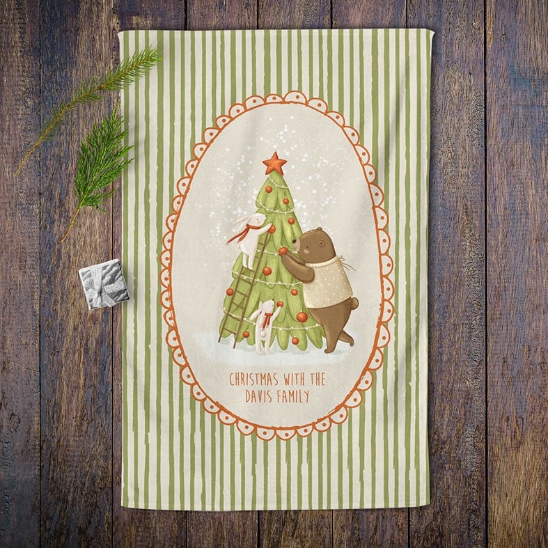 Personalised cotton Christmas Tree tea towel with festive green stripes and whimsical hand-drawn illustration