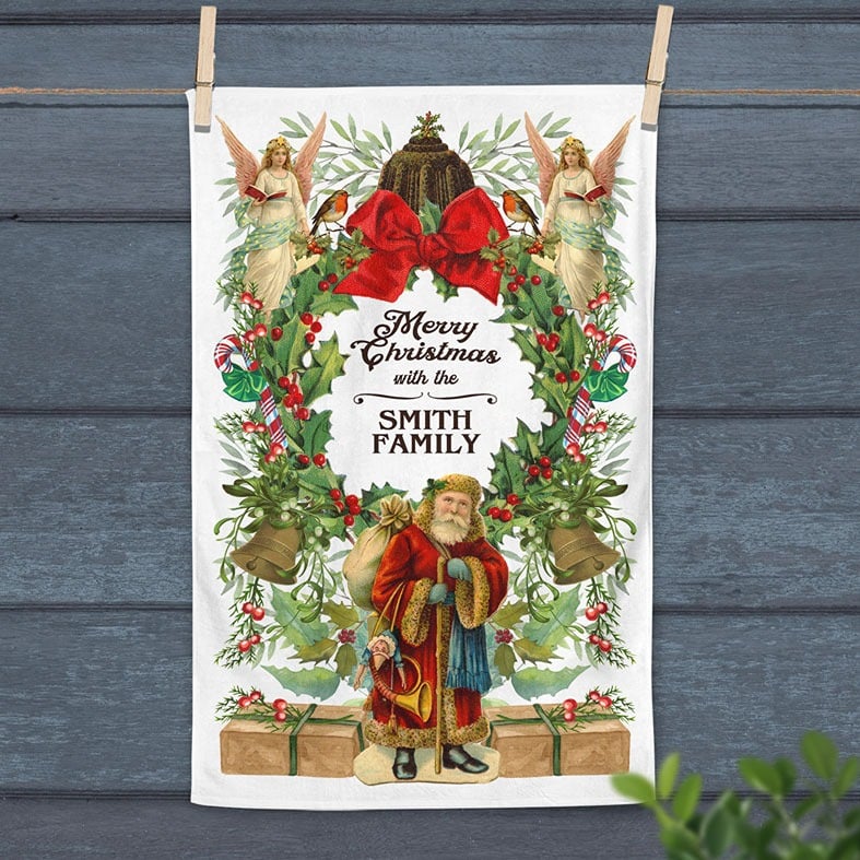Personalised cotton Victorian Christmas tea towel featuring colourful festive vintage illustrations