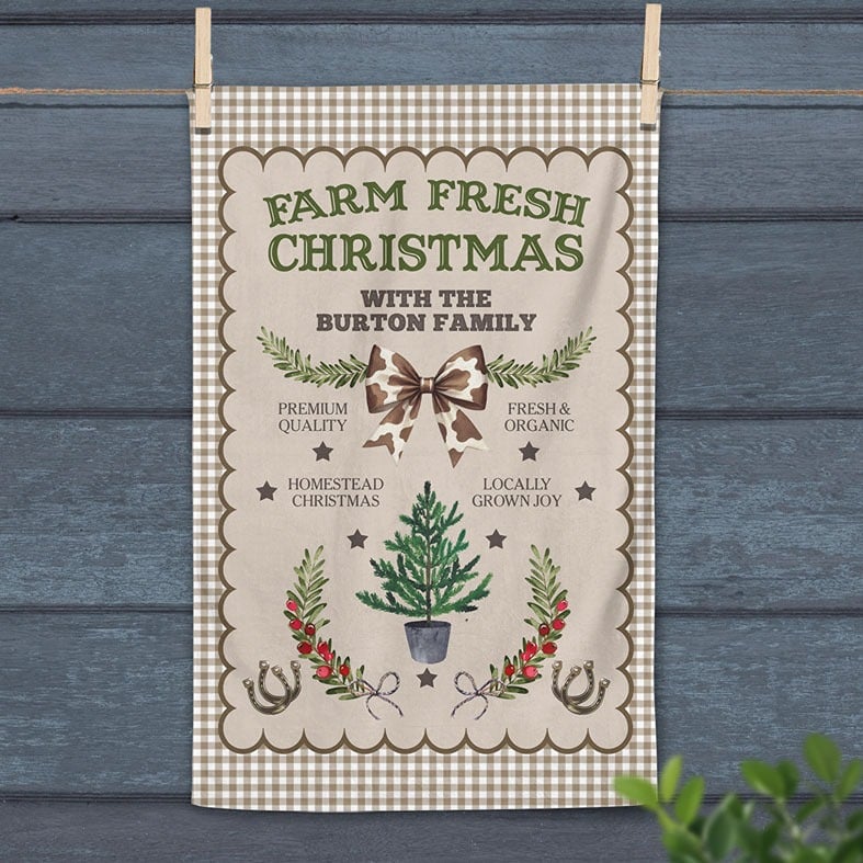 Personalised brown gingham Christmas tea towel with festive country kitchen cow print western illustrations