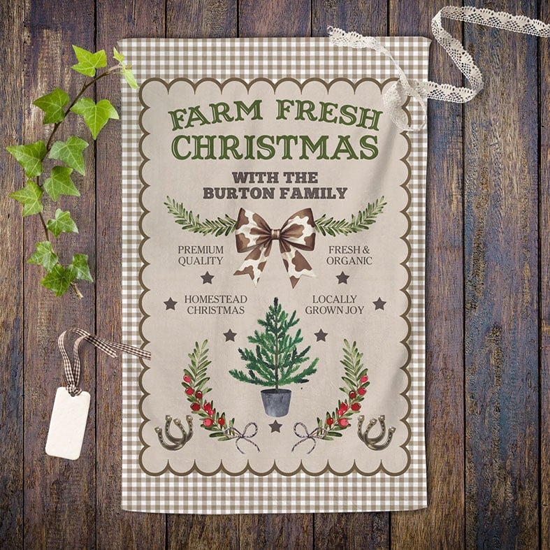 Personalised brown gingham Christmas tea towel with festive country kitchen cow print western illustrations