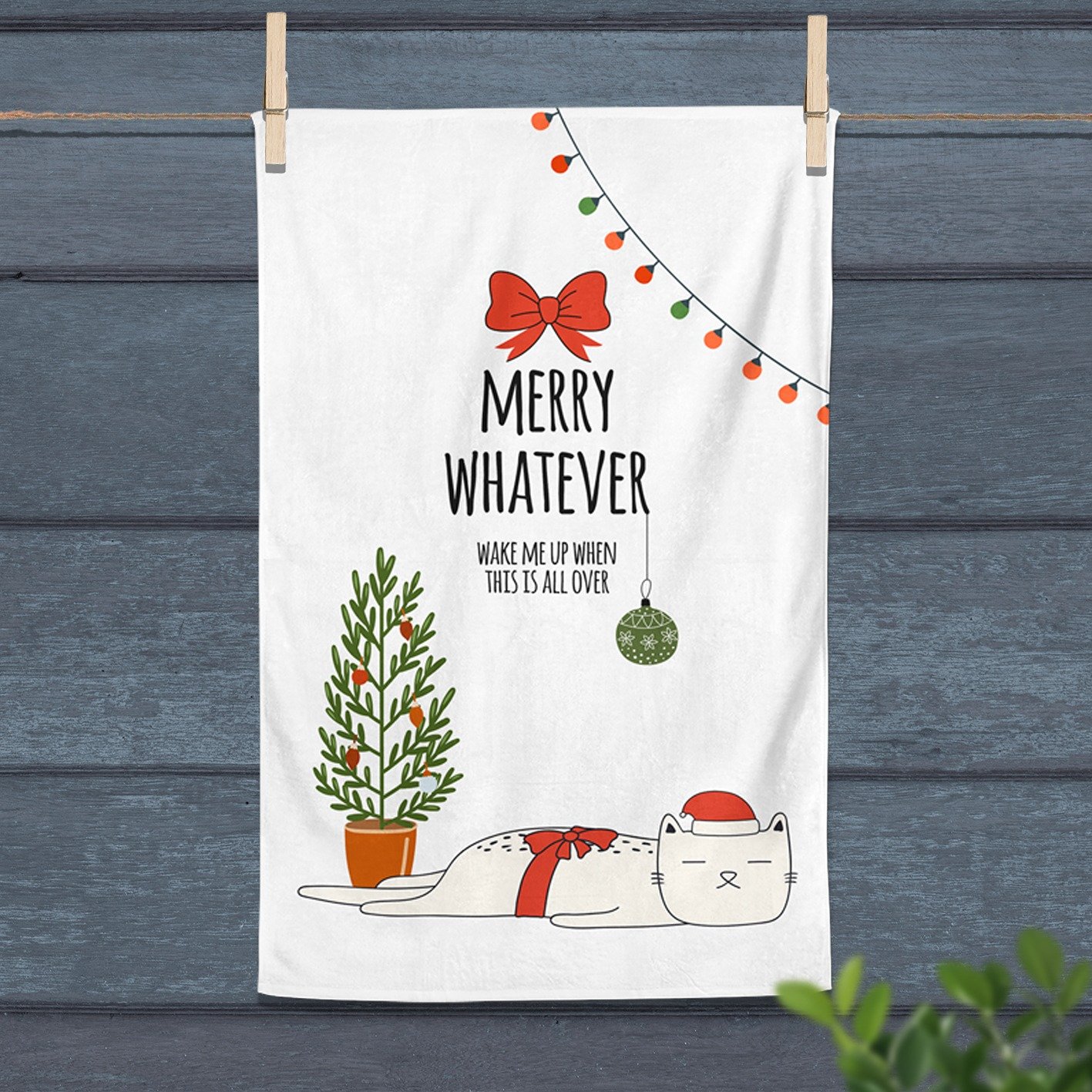 Personalised Christmas tea towel in white or beige with funny sleepy cat illustration and Merry Whatever wording