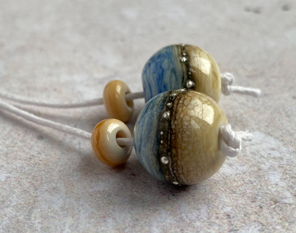 Marbled Blue and Ivory Glass Bead Pair