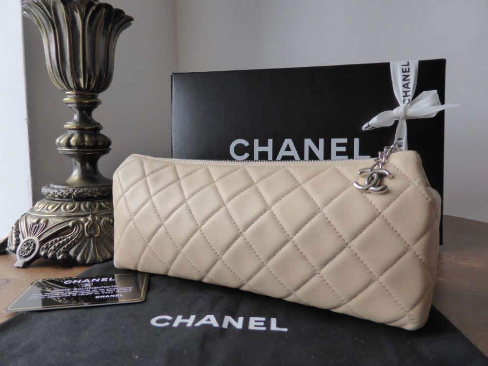 Chanel Zip Roll Make Up Case in Quilted Beige Lambskin - SOLD
