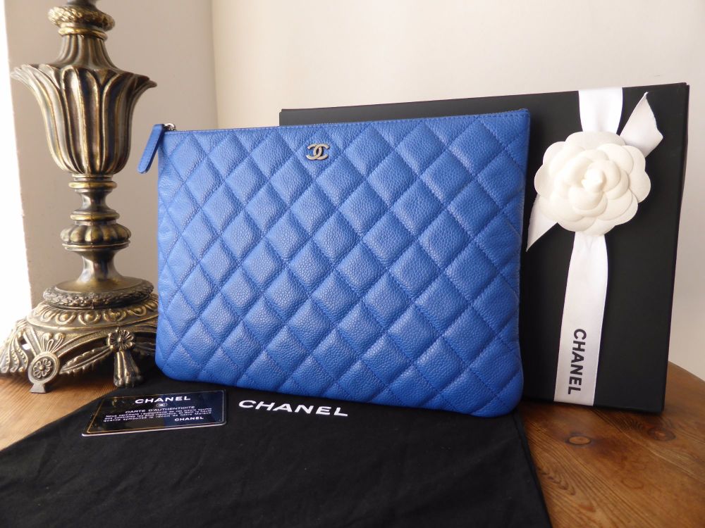 Chanel Medium Zipped O Case in Bright Blue Caviar Leather with Ruthenium Hardware - SOLD