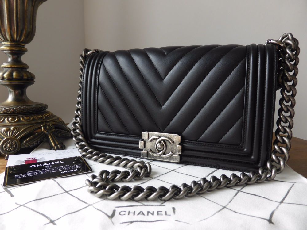Boy chanel handbag, Calfskin & ruthenium-finish metal, black — Fashion