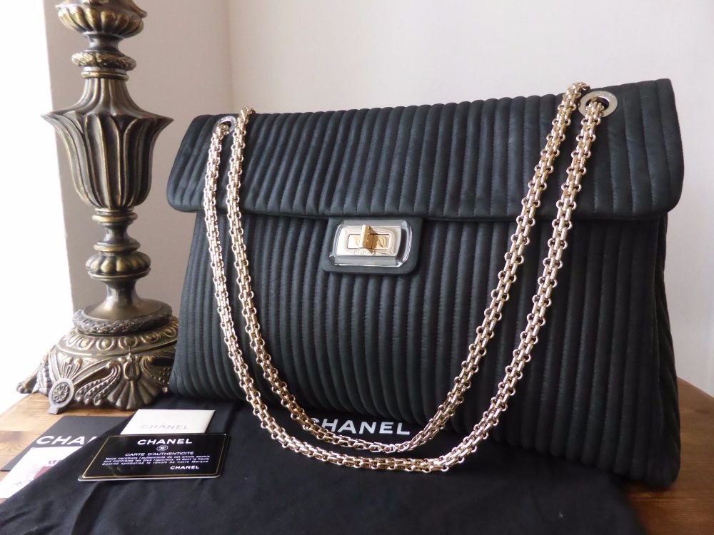 Chanel Vertical Quilted Reissue Mademoiselle Lock Maxi Bag in Iridescent  Black Velvet Calfskin - SOLD