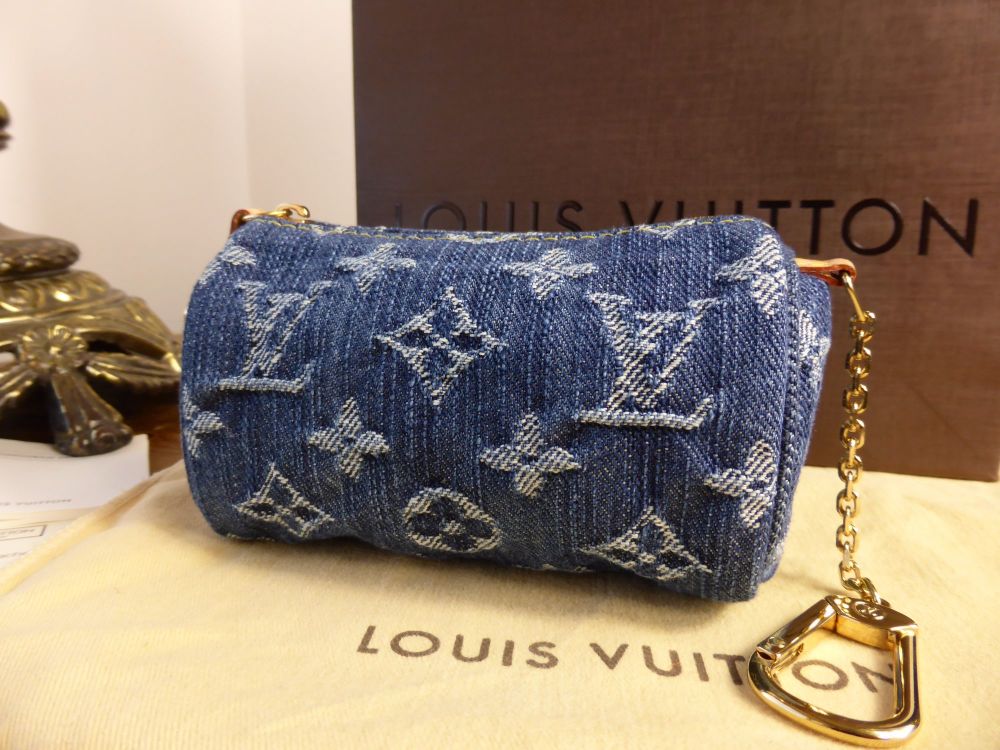 Louis Vuitton Blue Monogram Denim Pochette Clutch - ShopStyle