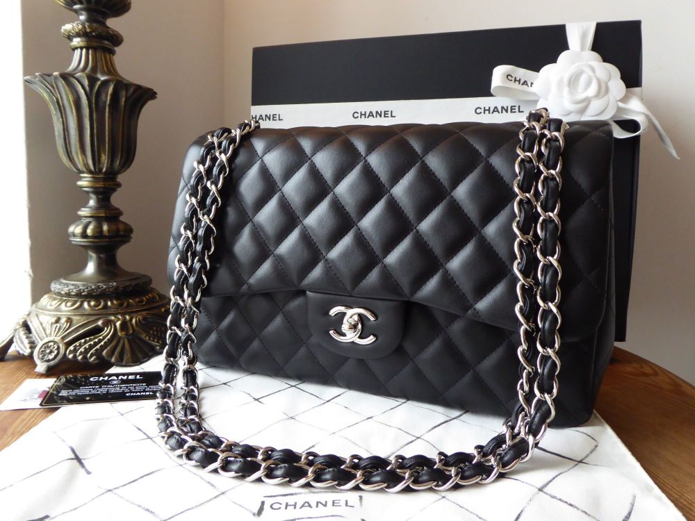 Chanel Timeless Classic 2.55 Double Jumbo Flap in Black Lambskin with  Silver Hardware - SOLD