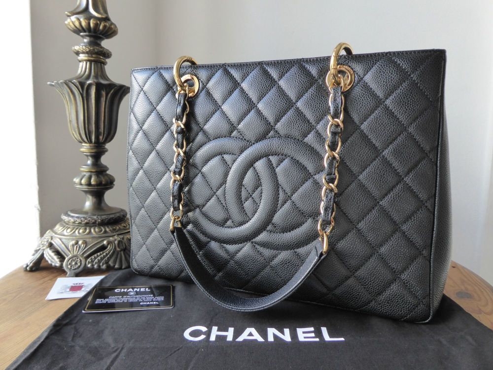 Chanel GST (grand shopping tote)in black caviar with gold hardware 17++  series Comes with Letter of Authenticity from Memes Treasure Condition, By Luxury purses by Jane's Closet