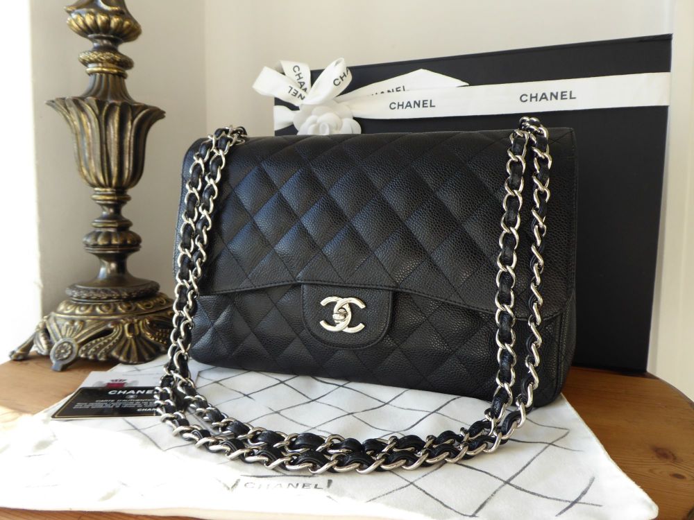 Chanel Timeless Classic 2.55 Double Jumbo Flap in Black Caviar with Silver  Hardware - SOLD