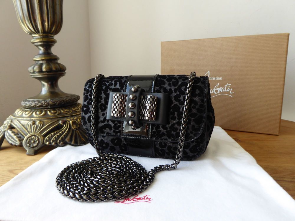 A Christian Louboutin Sweet charity leather mini bag. - Bukowskis