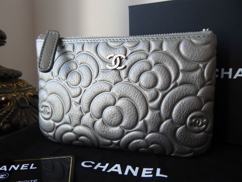Chanel Mini O Case Zip Pouch in Camellia Embossed Metallic Silver Calfskin